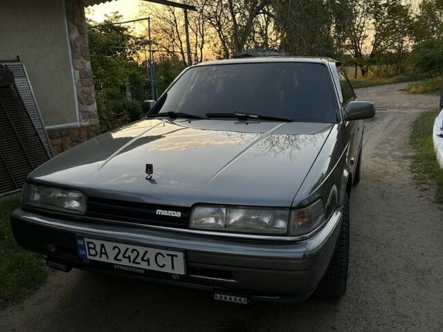 Серый Мазда 626, объемом двигателя 2 л и пробегом 406 тыс. км за 2000 $, фото 1 на Automoto.ua