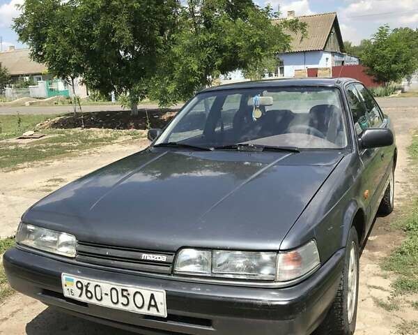 Серый Мазда 626, объемом двигателя 2 л и пробегом 286 тыс. км за 1246 $, фото 1 на Automoto.ua