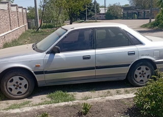 Серый Мазда 626, объемом двигателя 0 л и пробегом 200 тыс. км за 484 $, фото 1 на Automoto.ua