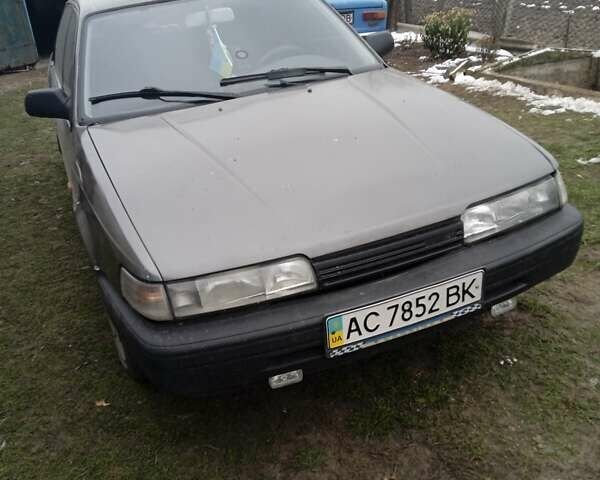 Серый Мазда 626, объемом двигателя 2 л и пробегом 350 тыс. км за 950 $, фото 1 на Automoto.ua