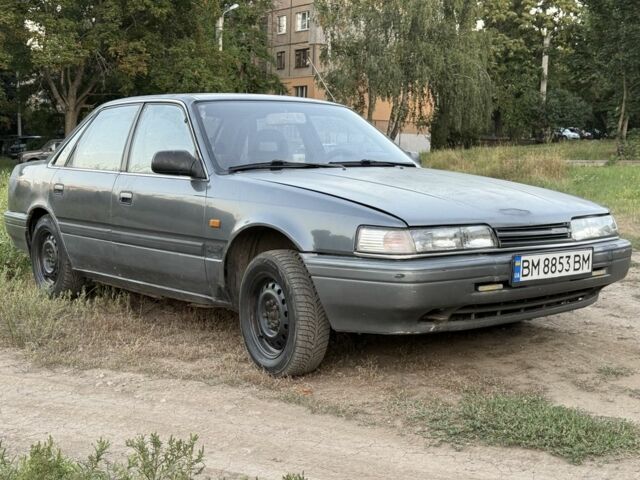 Серый Мазда 626, объемом двигателя 2 л и пробегом 350 тыс. км за 751 $, фото 1 на Automoto.ua