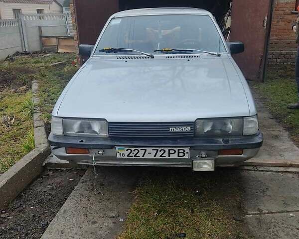 Серый Мазда 626, объемом двигателя 1.99 л и пробегом 286 тыс. км за 300 $, фото 1 на Automoto.ua