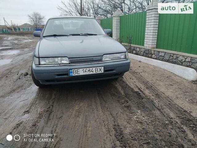 Серый Мазда 626, объемом двигателя 2 л и пробегом 300 тыс. км за 1800 $, фото 1 на Automoto.ua