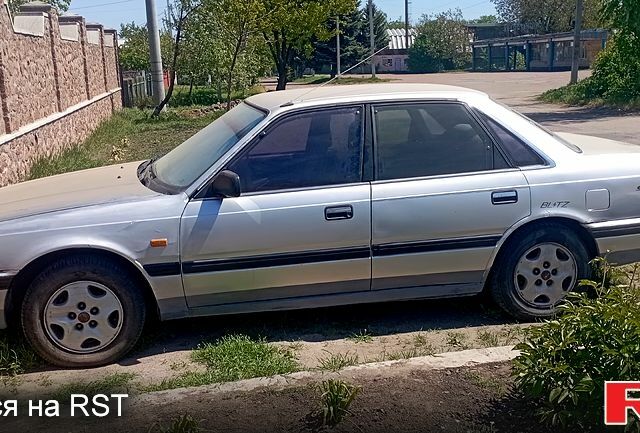 Серый Мазда 626, объемом двигателя 2 л и пробегом 0 тыс. км за 800 $, фото 1 на Automoto.ua