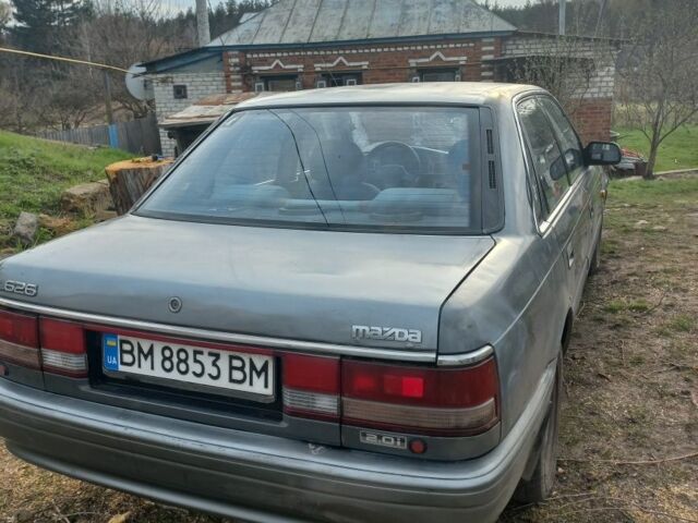 Серый Мазда 626, объемом двигателя 2 л и пробегом 300 тыс. км за 461 $, фото 1 на Automoto.ua