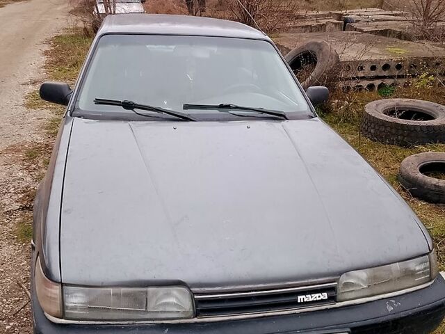 Серый Мазда 626, объемом двигателя 2.2 л и пробегом 400 тыс. км за 710 $, фото 1 на Automoto.ua