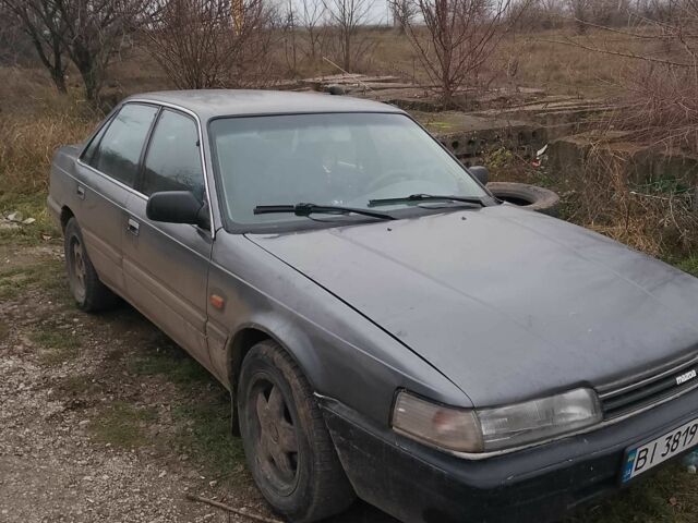 Серый Мазда 626, объемом двигателя 2.2 л и пробегом 440 тыс. км за 709 $, фото 1 на Automoto.ua