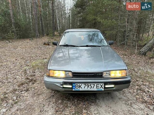 Серый Мазда 626, объемом двигателя 2 л и пробегом 470 тыс. км за 1000 $, фото 1 на Automoto.ua