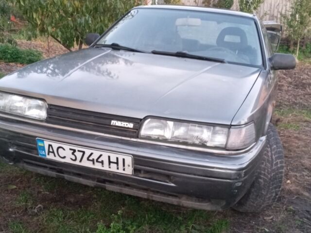Сірий Мазда 626, об'ємом двигуна 2 л та пробігом 384 тис. км за 950 $, фото 1 на Automoto.ua
