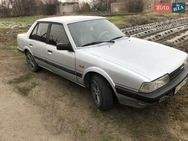 Серый Мазда 626, объемом двигателя 2 л и пробегом 390 тыс. км за 2200 $, фото 1 на Automoto.ua