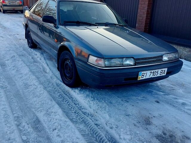 Серый Мазда 626, объемом двигателя 2.2 л и пробегом 345 тыс. км за 700 $, фото 1 на Automoto.ua