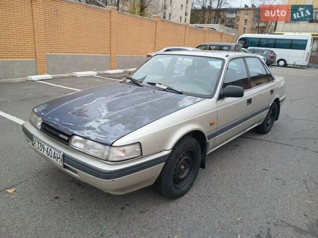 Серый Мазда 626, объемом двигателя 2 л и пробегом 449 тыс. км за 1300 $, фото 1 на Automoto.ua