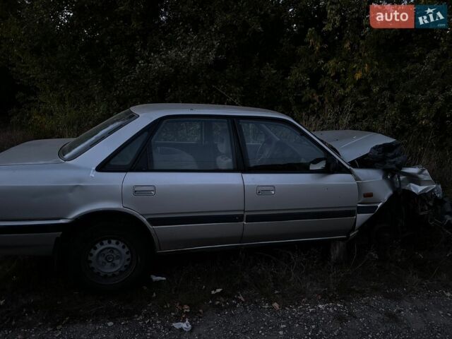 Серый Мазда 626, объемом двигателя 2 л и пробегом 357 тыс. км за 600 $, фото 1 на Automoto.ua