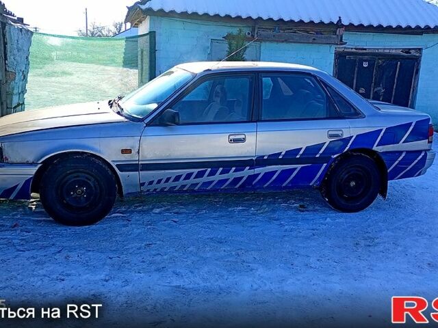 Серый Мазда 626, объемом двигателя 2 л и пробегом 10 тыс. км за 820 $, фото 1 на Automoto.ua