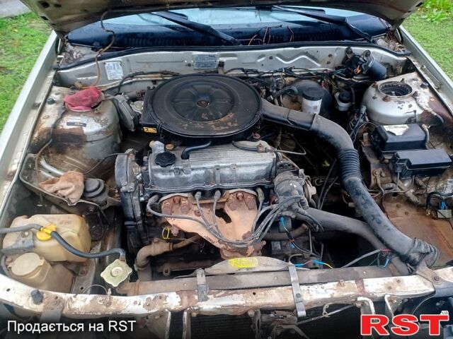 Серый Мазда 626, объемом двигателя 2 л и пробегом 450 тыс. км за 1000 $, фото 1 на Automoto.ua