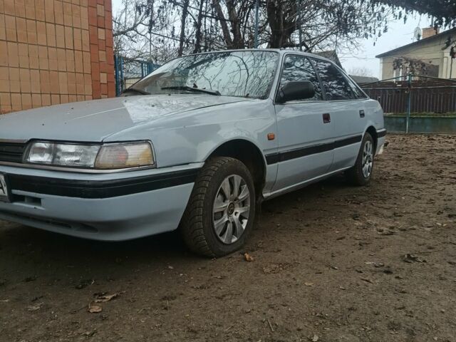 Серый Мазда 626, объемом двигателя 2 л и пробегом 650 тыс. км за 734 $, фото 1 на Automoto.ua