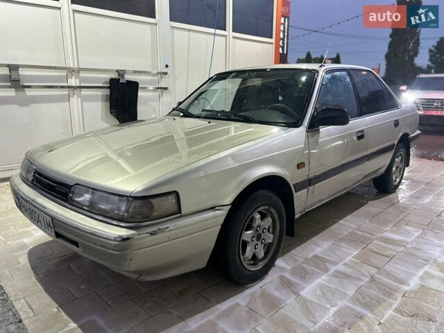 Серый Мазда 626, объемом двигателя 2 л и пробегом 25 тыс. км за 1250 $, фото 1 на Automoto.ua