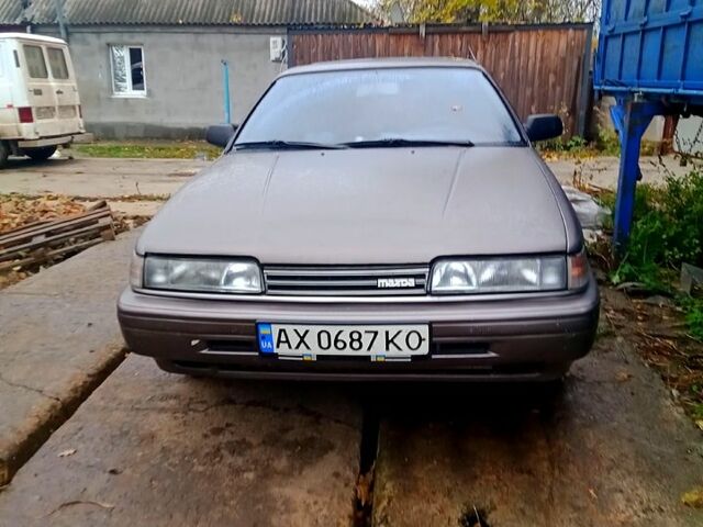 Серый Мазда 626, объемом двигателя 2 л и пробегом 558 тыс. км за 1500 $, фото 1 на Automoto.ua