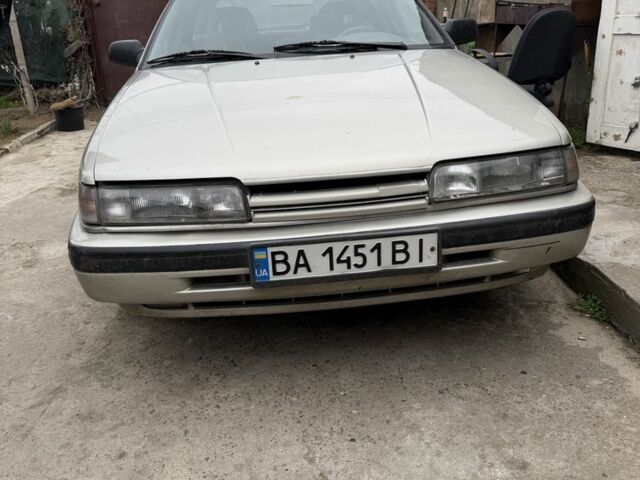 Сірий Мазда 626, об'ємом двигуна 2.2 л та пробігом 200 тис. км за 1500 $, фото 1 на Automoto.ua