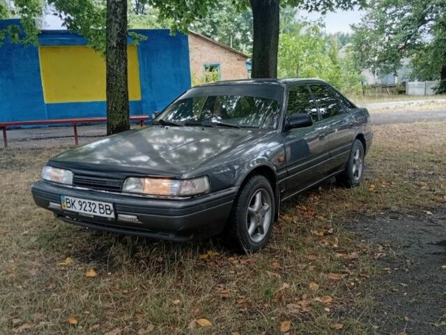 Серый Мазда 626, объемом двигателя 2 л и пробегом 213 тыс. км за 1498 $, фото 1 на Automoto.ua