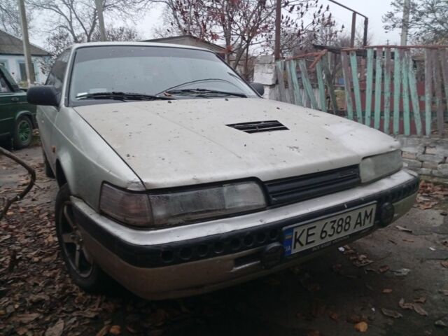 Серый Мазда 626, объемом двигателя 1.8 л и пробегом 594 тыс. км за 953 $, фото 1 на Automoto.ua