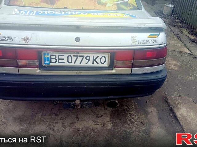 Серый Мазда 626, объемом двигателя 2 л и пробегом 278 тыс. км за 1200 $, фото 1 на Automoto.ua