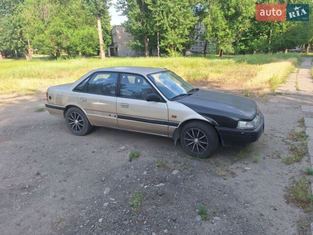 Серый Мазда 626, объемом двигателя 1.8 л и пробегом 300 тыс. км за 1600 $, фото 1 на Automoto.ua