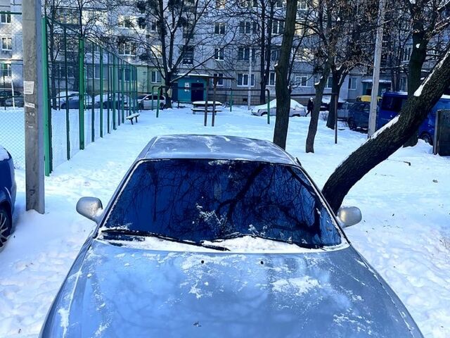 Серый Мазда 626, объемом двигателя 2 л и пробегом 454 тыс. км за 1900 $, фото 1 на Automoto.ua