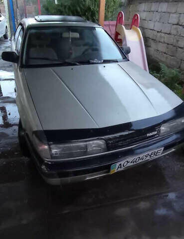 Серый Мазда 626, объемом двигателя 2 л и пробегом 322 тыс. км за 650 $, фото 1 на Automoto.ua