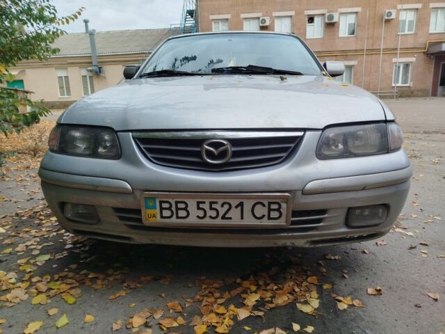 Серый Мазда 626, объемом двигателя 2 л и пробегом 400 тыс. км за 1354 $, фото 1 на Automoto.ua