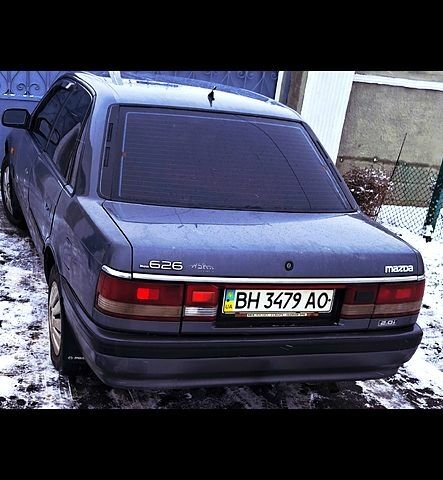 Сірий Мазда 626, об'ємом двигуна 2 л та пробігом 300 тис. км за 1500 $, фото 1 на Automoto.ua