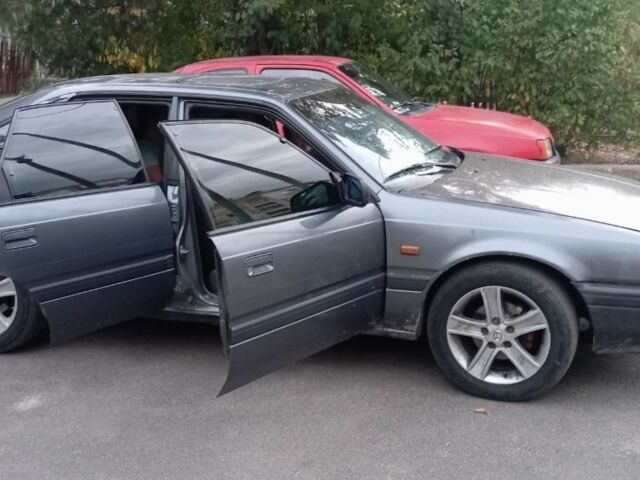 Сірий Мазда 626, об'ємом двигуна 2 л та пробігом 500 тис. км за 1396 $, фото 1 на Automoto.ua