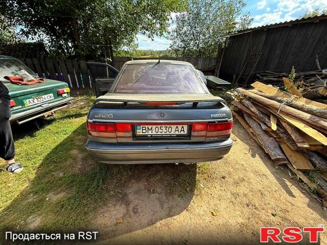 Сірий Мазда 626, об'ємом двигуна 2 л та пробігом 0 тис. км за 600 $, фото 1 на Automoto.ua