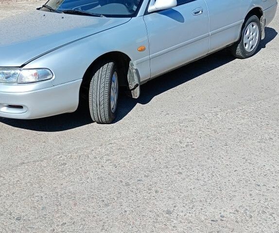 Сірий Мазда 626, об'ємом двигуна 2 л та пробігом 438 тис. км за 1499 $, фото 1 на Automoto.ua