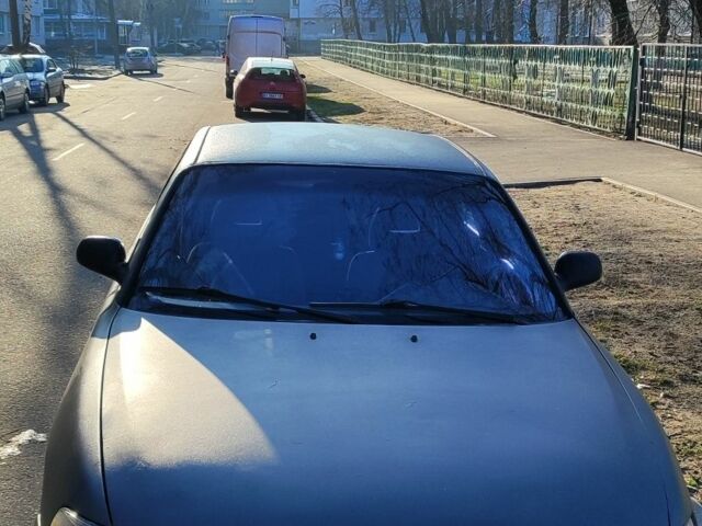 Серый Мазда 626, объемом двигателя 1.8 л и пробегом 390 тыс. км за 1200 $, фото 1 на Automoto.ua