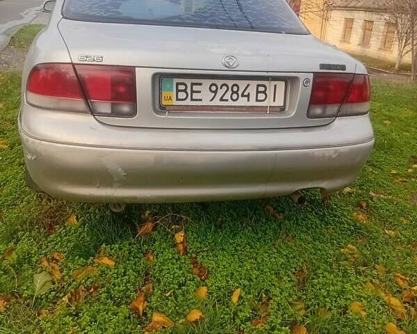 Серый Мазда 626, объемом двигателя 2 л и пробегом 404 тыс. км за 1300 $, фото 1 на Automoto.ua