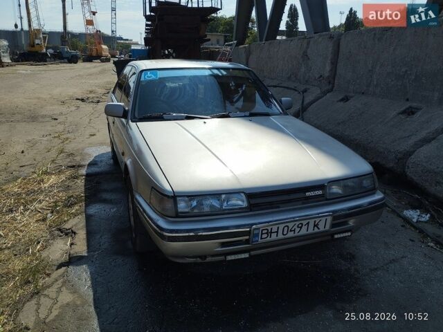 Серый Мазда 626, объемом двигателя 2 л и пробегом 552 тыс. км за 1403 $, фото 1 на Automoto.ua