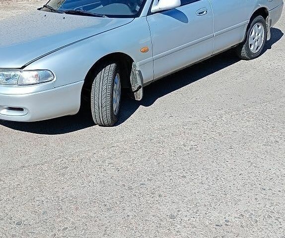 Сірий Мазда 626, об'ємом двигуна 2 л та пробігом 438 тис. км за 1499 $, фото 1 на Automoto.ua