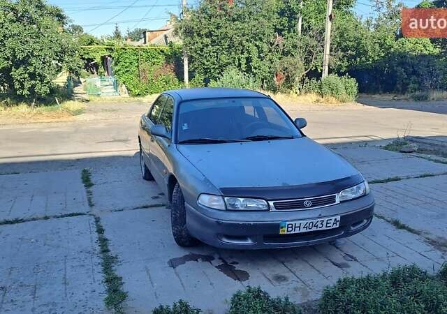 Серый Мазда 626, объемом двигателя 2 л и пробегом 350 тыс. км за 2100 $, фото 1 на Automoto.ua