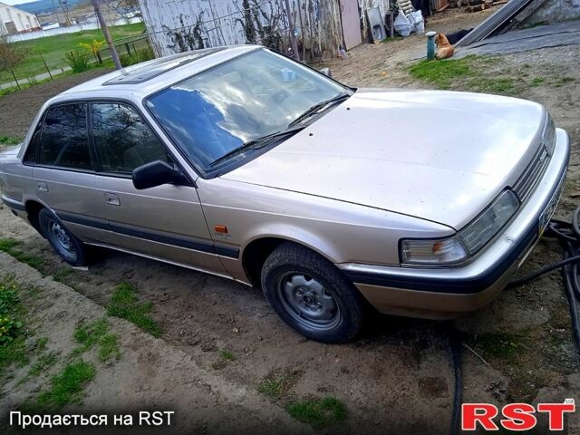 Серый Мазда 626, объемом двигателя 1.8 л и пробегом 0 тыс. км за 1100 $, фото 1 на Automoto.ua