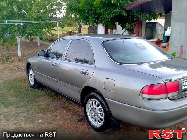 Сірий Мазда 626, об'ємом двигуна 1.8 л та пробігом 325 тис. км за 1500 $, фото 1 на Automoto.ua