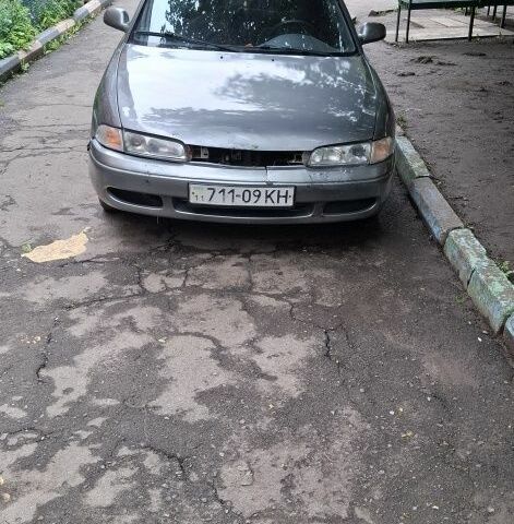 Серый Мазда 626, объемом двигателя 2.5 л и пробегом 300 тыс. км за 477 $, фото 1 на Automoto.ua