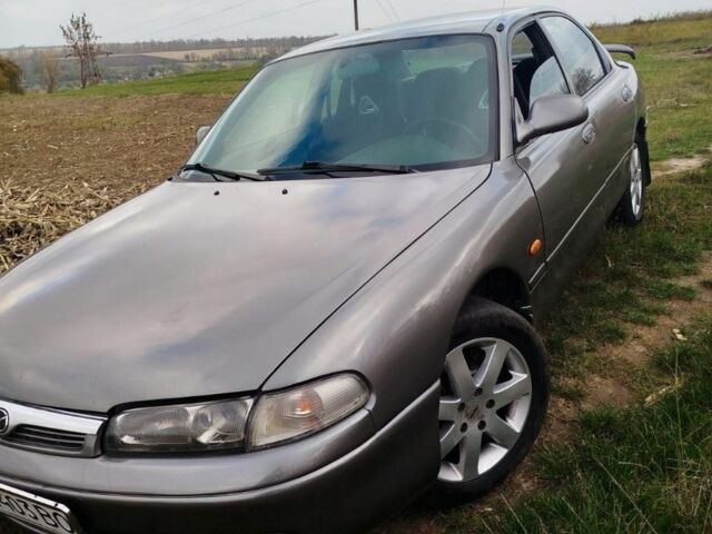 Серый Мазда 626, объемом двигателя 2 л и пробегом 390 тыс. км за 1950 $, фото 1 на Automoto.ua