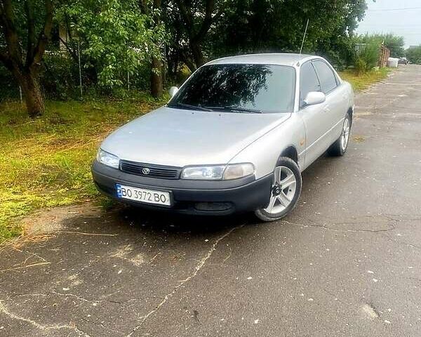 Серый Мазда 626, объемом двигателя 2 л и пробегом 240 тыс. км за 1999 $, фото 1 на Automoto.ua