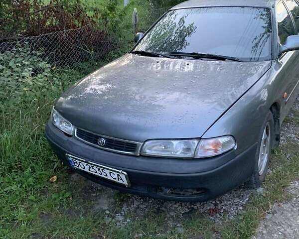 Серый Мазда 626, объемом двигателя 2 л и пробегом 200 тыс. км за 1800 $, фото 1 на Automoto.ua