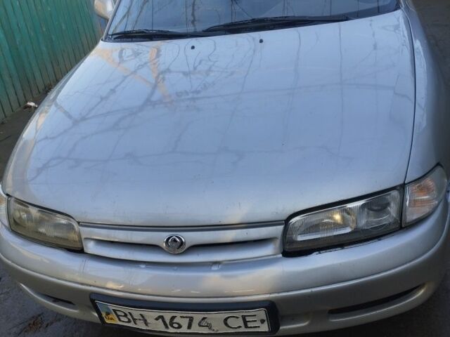 Серый Мазда 626, объемом двигателя 2 л и пробегом 200 тыс. км за 1950 $, фото 1 на Automoto.ua