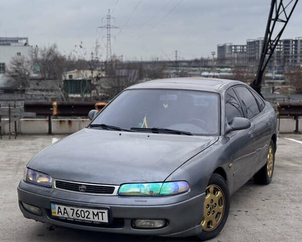 Сірий Мазда 626, об'ємом двигуна 2.5 л та пробігом 220 тис. км за 1400 $, фото 1 на Automoto.ua