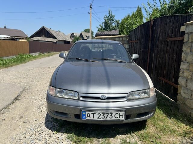Серый Мазда 626, объемом двигателя 2 л и пробегом 263 тыс. км за 1000 $, фото 1 на Automoto.ua