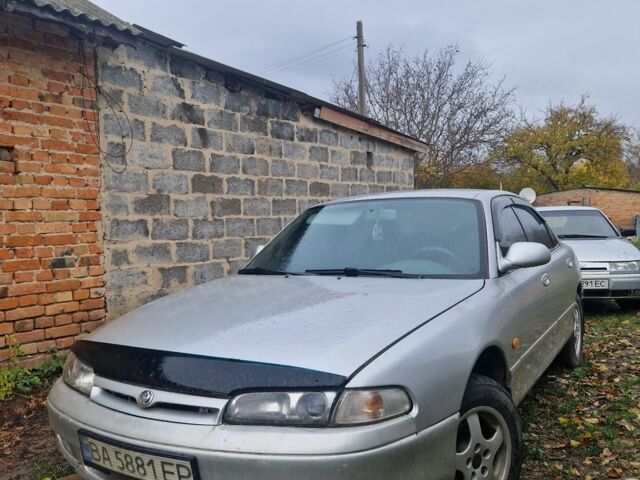 Серый Мазда 626, объемом двигателя 2 л и пробегом 422 тыс. км за 3000 $, фото 1 на Automoto.ua