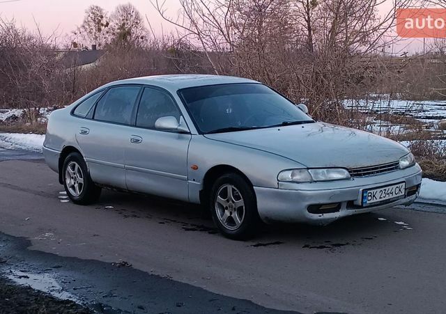 Серый Мазда 626, объемом двигателя 1.8 л и пробегом 393 тыс. км за 999 $, фото 1 на Automoto.ua